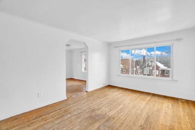 spare room featuring light wood-type flooring