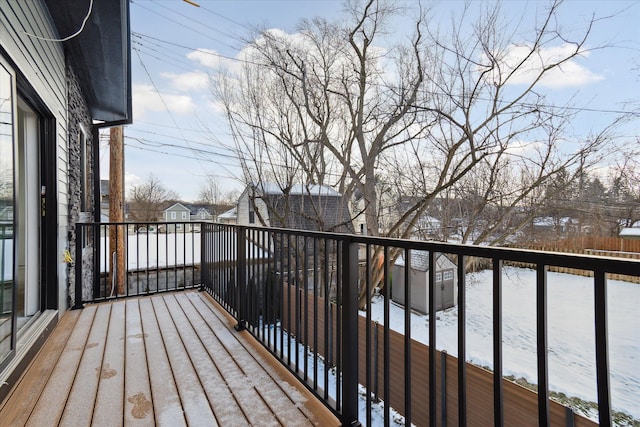 view of snow covered deck