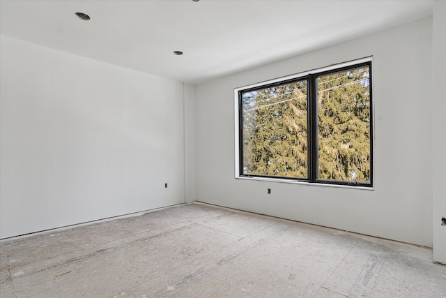 unfurnished room with plenty of natural light