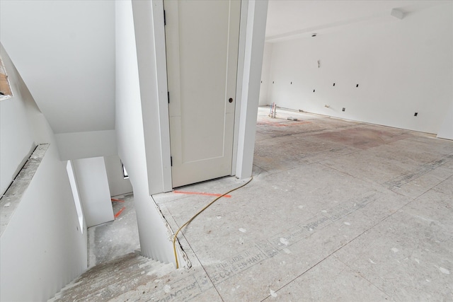 interior space featuring lofted ceiling