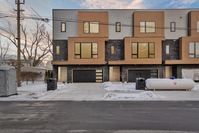 modern home featuring a garage