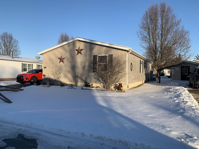 view of snow covered property