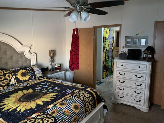 bedroom with ceiling fan and light carpet