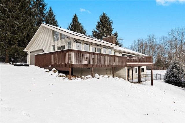 view of front of home with a wooden deck