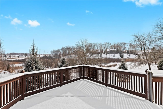 view of snow covered deck