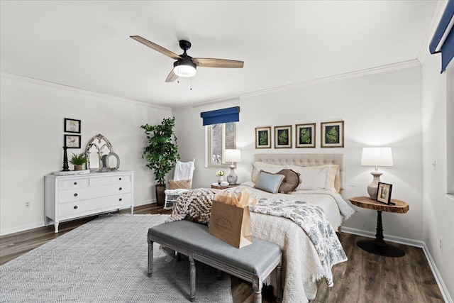 bedroom featuring ceiling fan, dark hardwood / wood-style floors, and ornamental molding