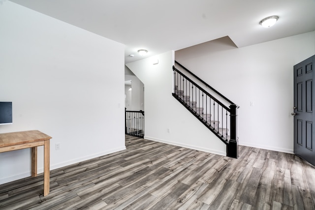 foyer entrance featuring hardwood / wood-style floors