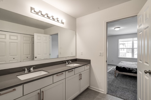 bathroom featuring tile patterned floors and vanity