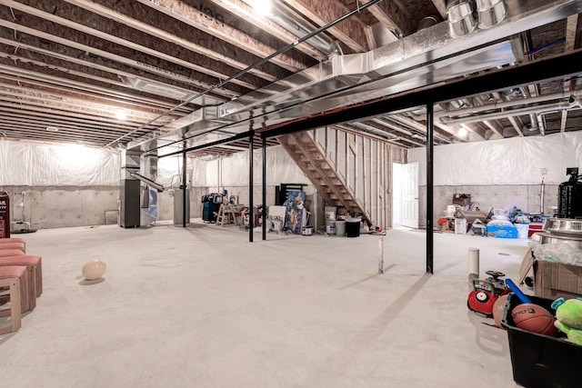 basement featuring heating unit