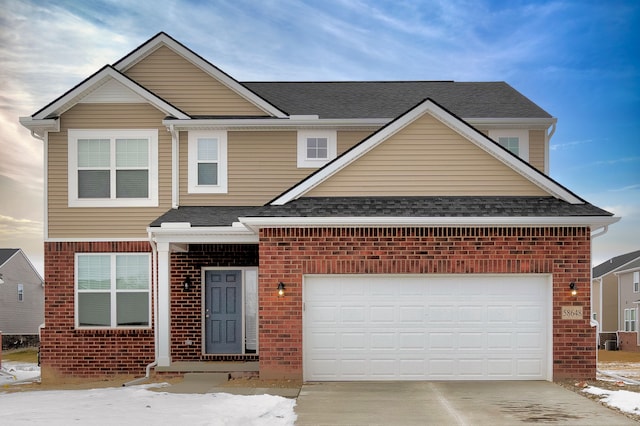 view of front of property with a garage