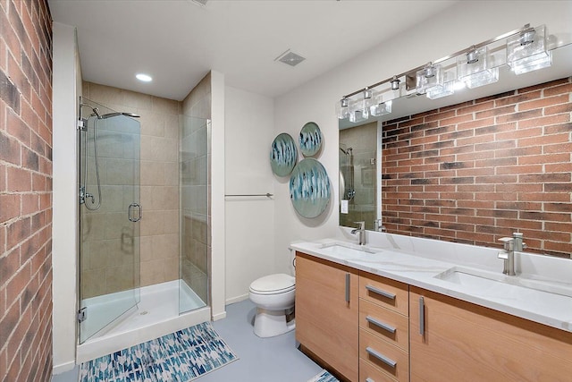 bathroom with walk in shower, vanity, and toilet