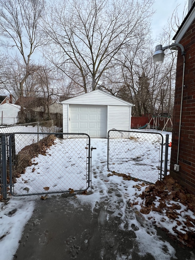 exterior space featuring an outbuilding and a garage