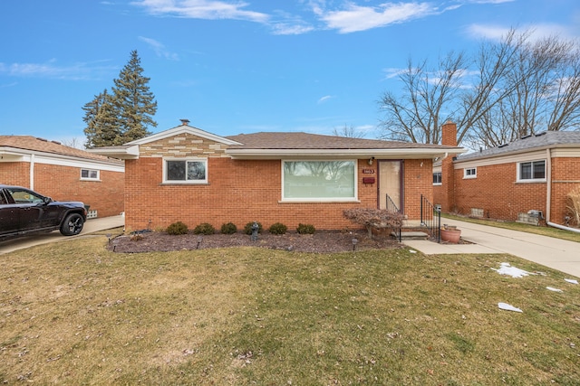 single story home with a front yard