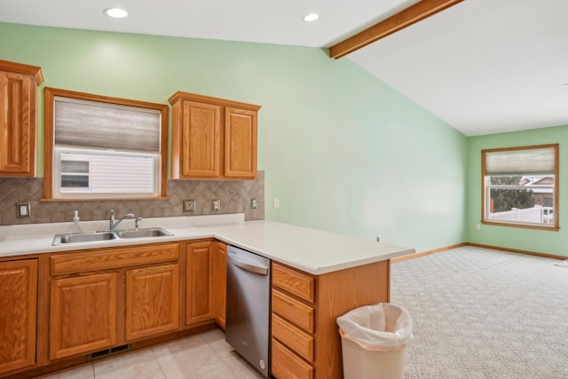 kitchen with sink, vaulted ceiling with beams, tasteful backsplash, kitchen peninsula, and dishwasher