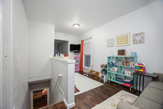 interior space with dark hardwood / wood-style flooring