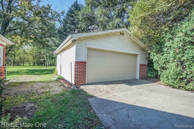 garage with a yard