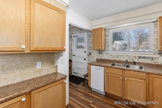 kitchen with sink, backsplash, dark hardwood / wood-style floors, and white dishwasher