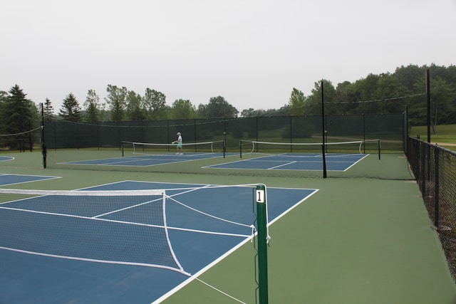 view of tennis court with basketball court