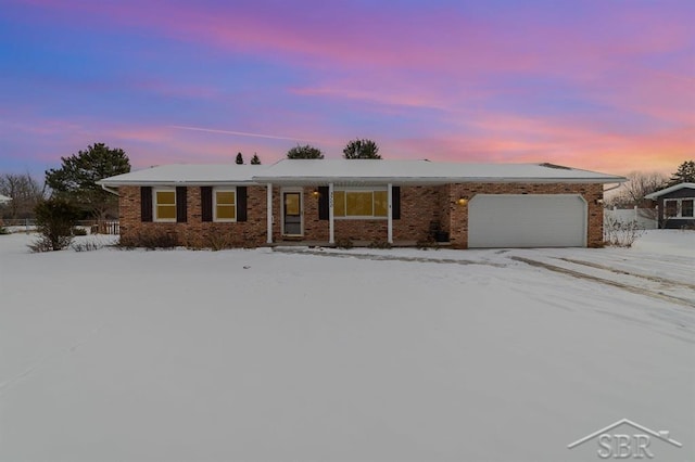 single story home with a garage