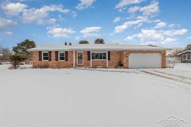 single story home featuring a garage