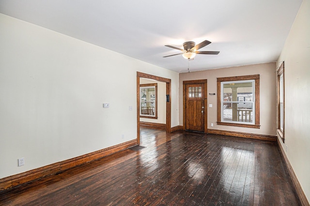 entryway with ceiling fan and dark hardwood / wood-style flooring