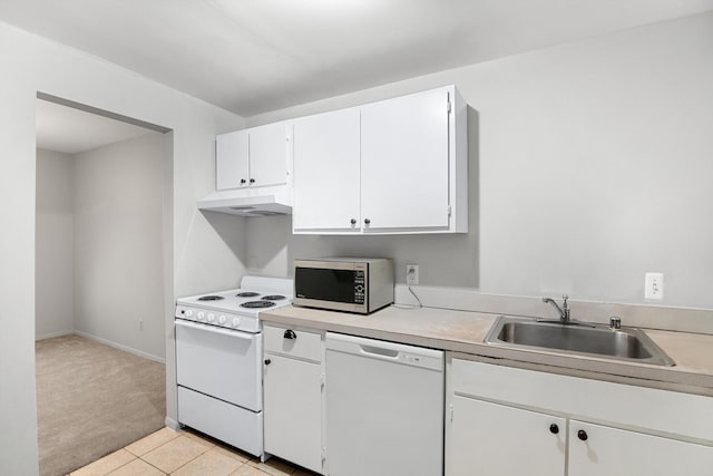 kitchen with white cabinetry, sink, white appliances, and light colored carpet