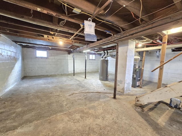 basement with heating unit and water heater