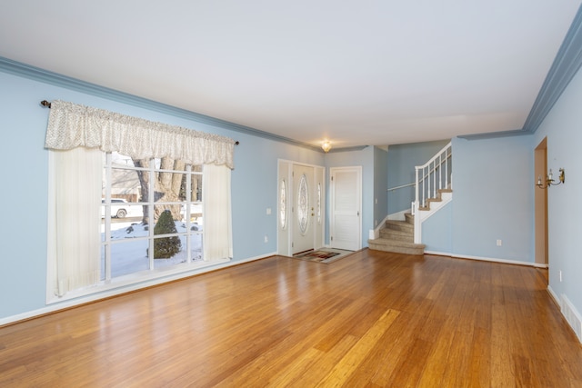 interior space featuring ornamental molding and hardwood / wood-style floors