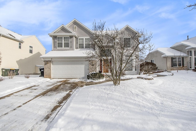 view of front of house with a garage and brick siding