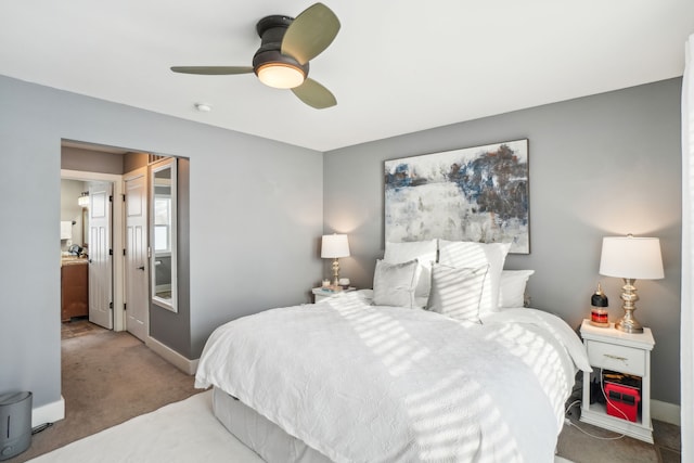 carpeted bedroom with ceiling fan