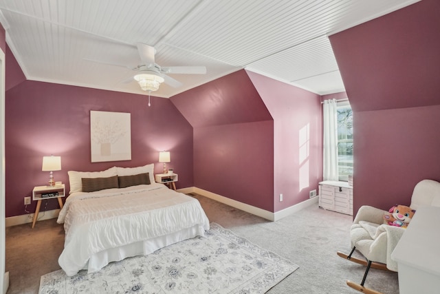 carpeted bedroom with ceiling fan and lofted ceiling