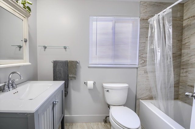 full bathroom featuring toilet, vanity, and shower / bath combination with curtain