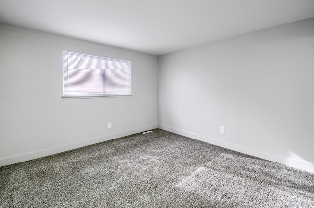 empty room with carpet floors