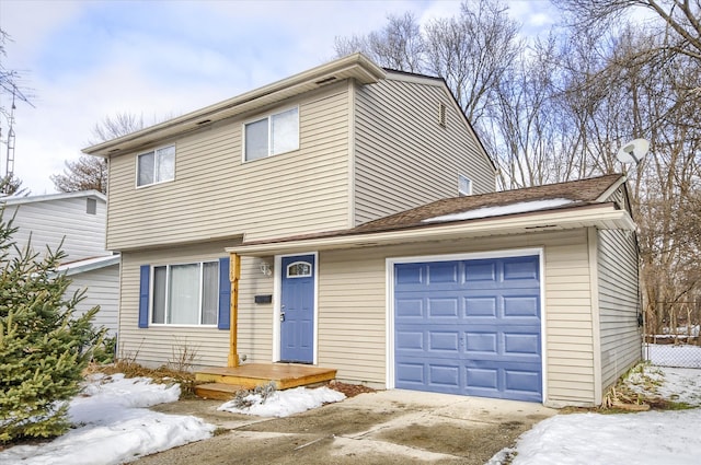 front of property with a garage