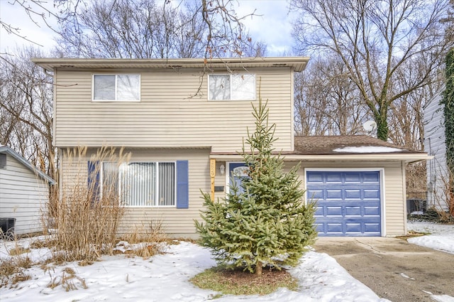 view of front of property featuring a garage