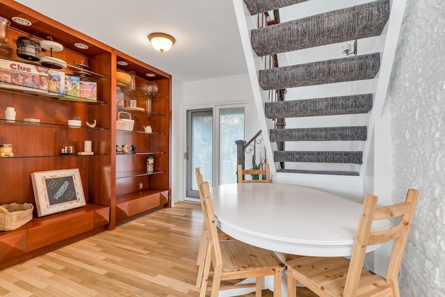 dining room featuring light hardwood / wood-style floors