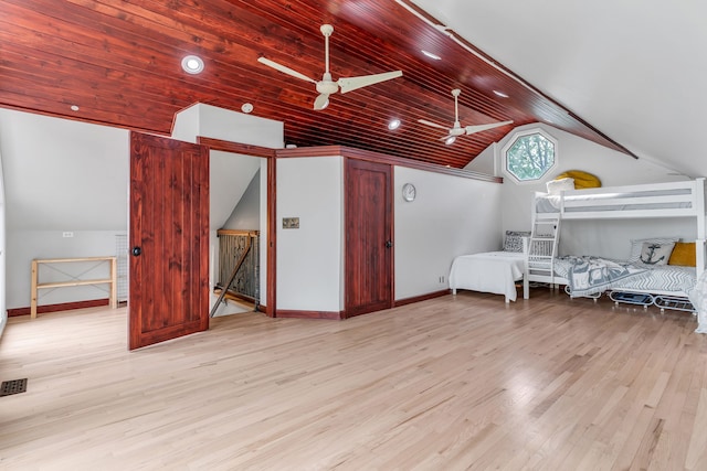 interior space featuring ceiling fan, wooden ceiling, lofted ceiling, and light wood-type flooring