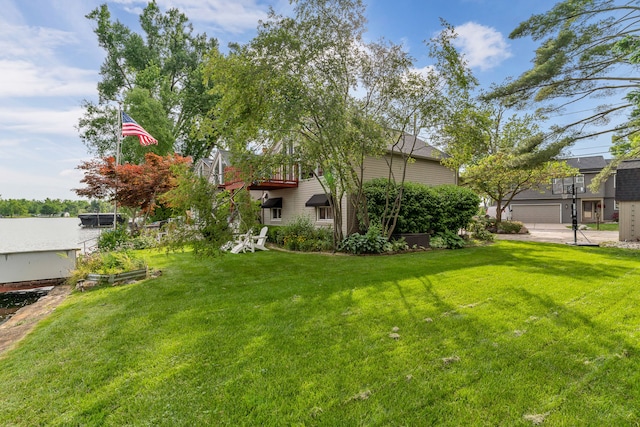 view of yard with a garage