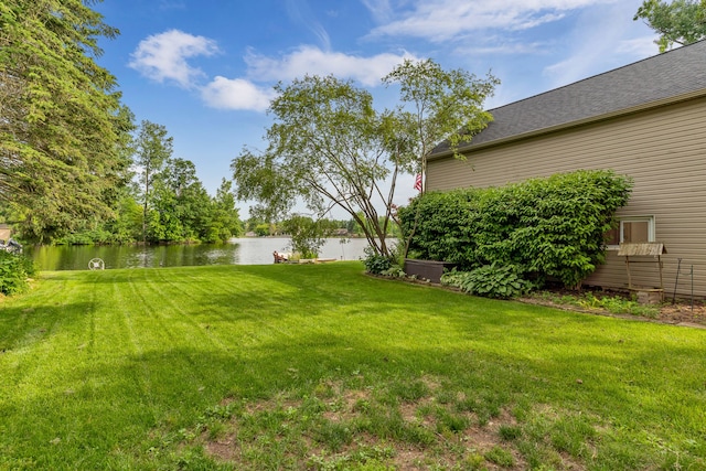 view of yard with a water view