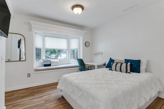 bedroom featuring hardwood / wood-style floors