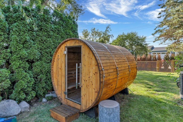 view of outdoor structure with a yard