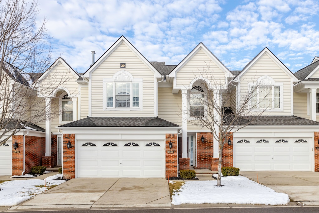 view of front of property with a garage