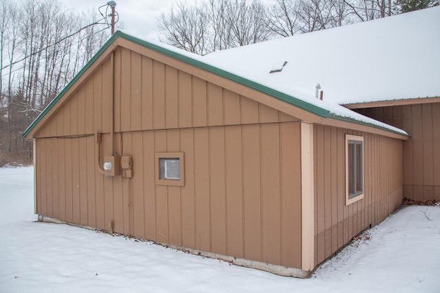 view of snow covered property