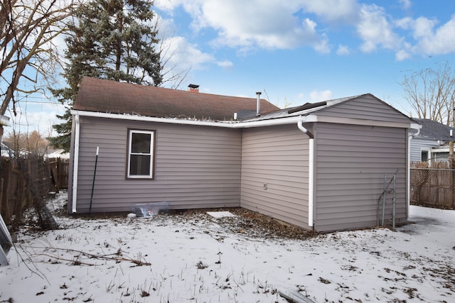 view of snow covered property