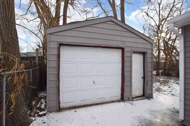 view of snow covered garage