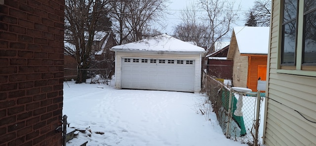 view of snow covered garage