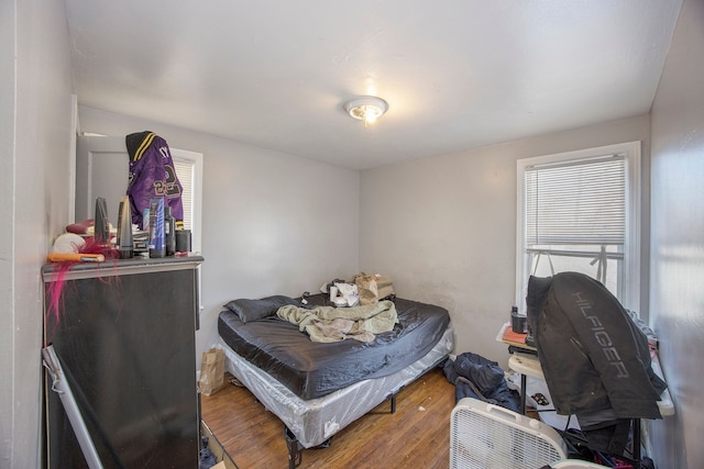 bedroom featuring hardwood / wood-style floors