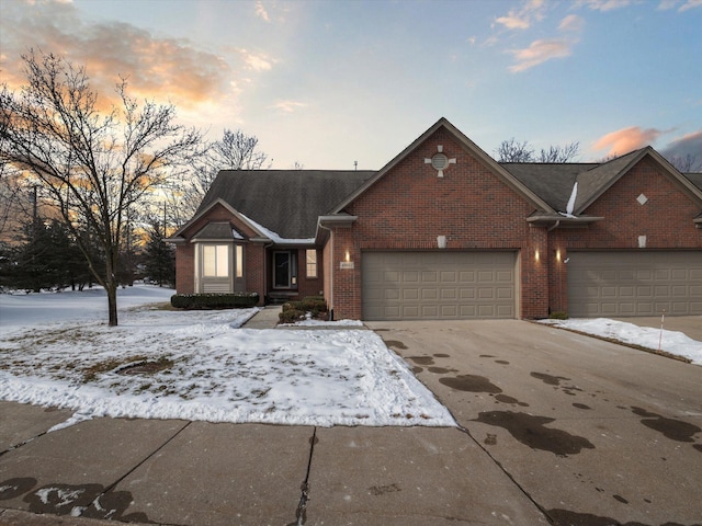 view of front of property with a garage