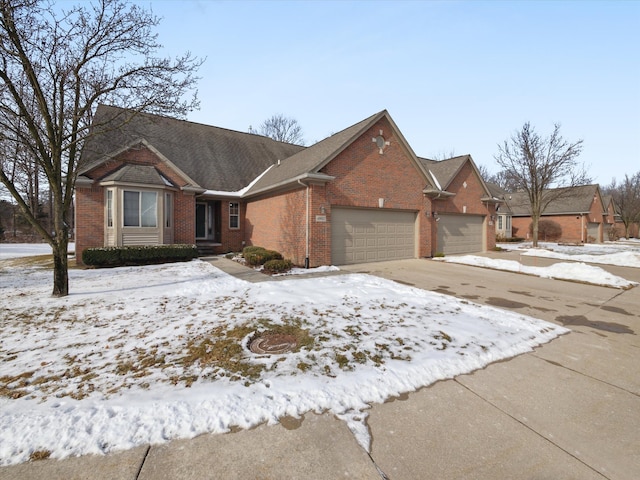 single story home featuring a garage