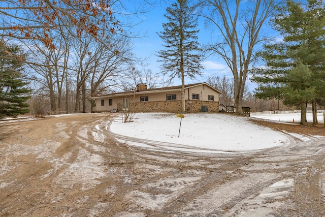 view of snow covered property